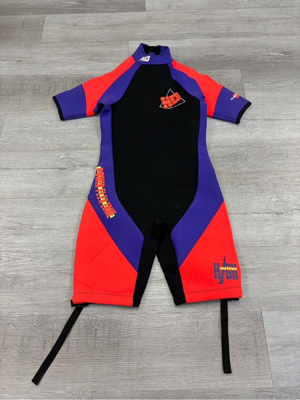 Short Sleeve One-Piece Wetsuit in Black, Red & Purple fits like a small
